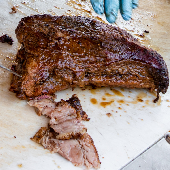 Brisket smoking on a grill at John Mull’s Meat Market and Road Kill Grill in Las Vegas