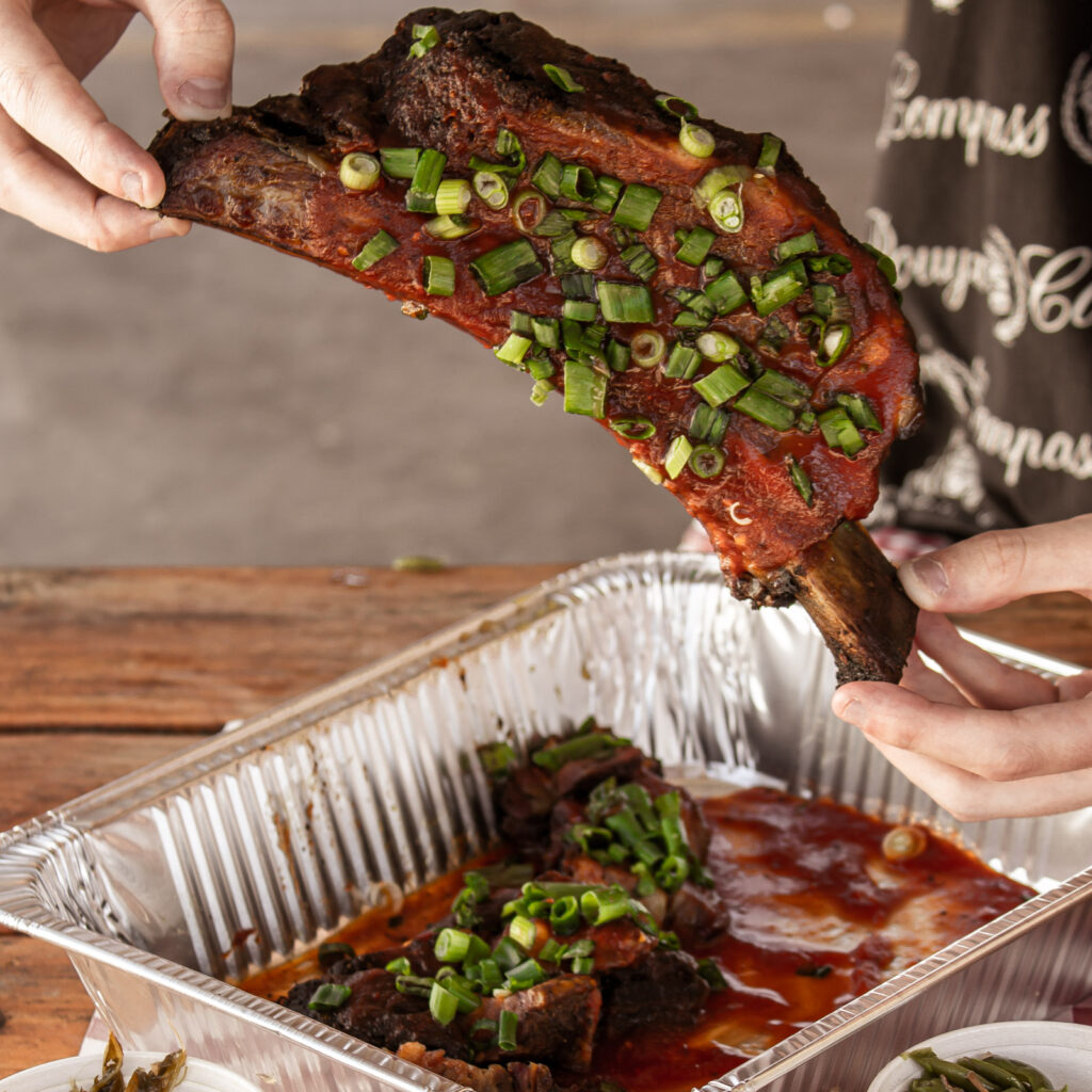 Fall BBQ rib special at John Mull’s Road Kill Grill topped with green onions and sauce