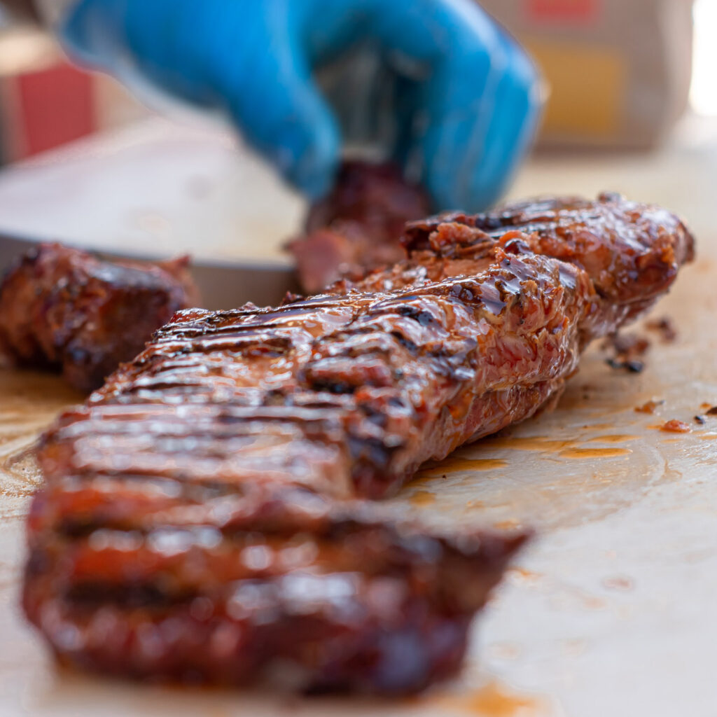 Juicy grilled meat sliced by hand at local BBQ butcher shop in Las Vegas