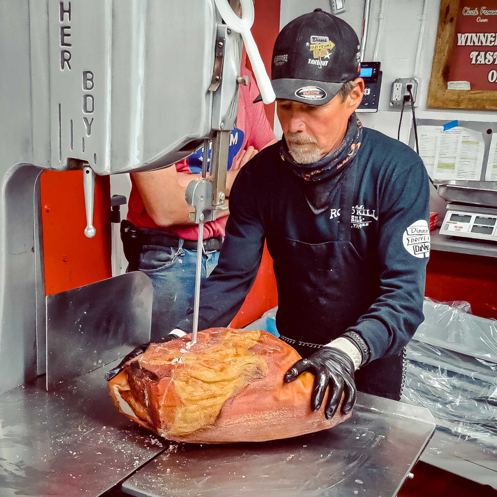 Pitmasters preparing smoked meats at John Mull’s Road Kill Grill in Las Vegas