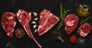 Assorted raw beef cuts with garlic, rosemary, and spices—perfect for smoking and BBQ.Freshness you will not find at any grocery store.