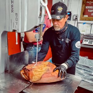Fresh beef cuts on the butcher block at John Mull’s Meats in Las Vegas, prepared by expert butchers at the award-winning Best Butcher Shop 2025.