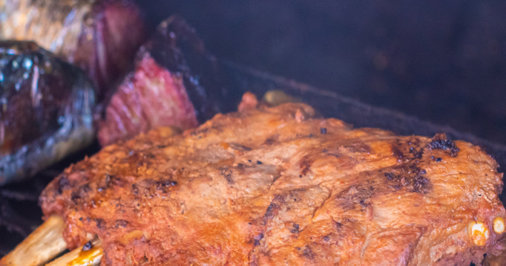 Close-up of slow-smoked BBQ meat at John Mull’s Road Kill Grill, an authentic BBQ restaurant in Las Vegas known for bold flavor.